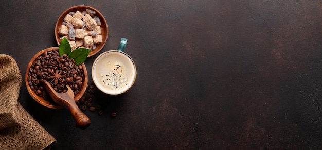 Roasted coffee beans and espresso cup