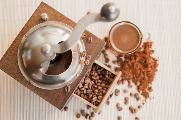 Roasted coffee beans in home grinder