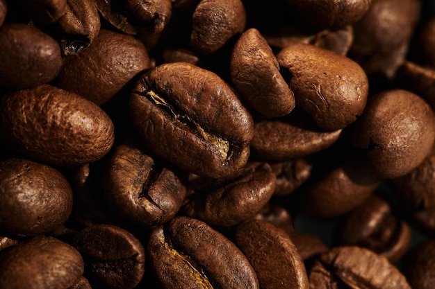 Roasted coffee beans macro close up background