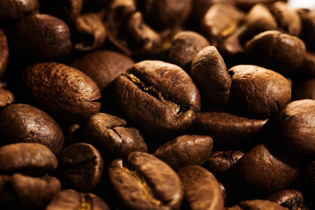 Roasted coffee beans macro close up background