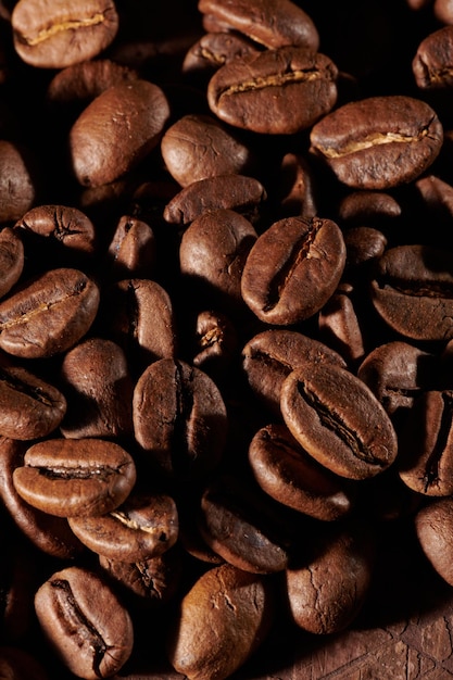 Roasted coffee beans macro close up background