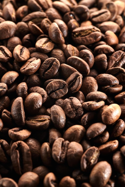 Roasted coffee beans macro close up background