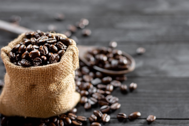 Roasted coffee beans put in small sack.