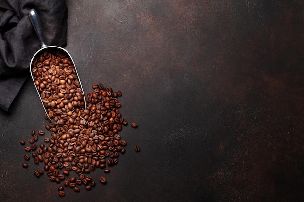 Roasted coffee beans in scoop