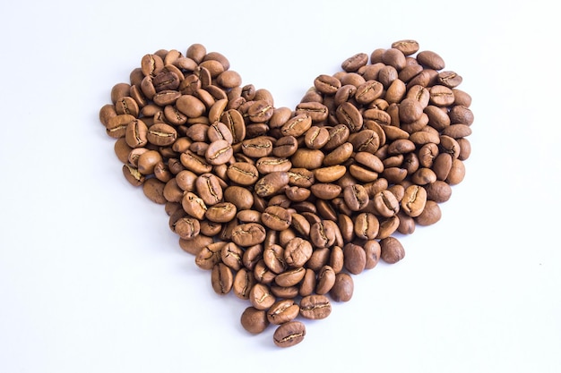 Roasted coffee beans in the shape of the heart