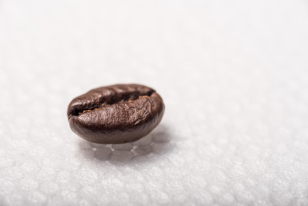 Roasted coffee beans on a white background Styrofoam Round texture