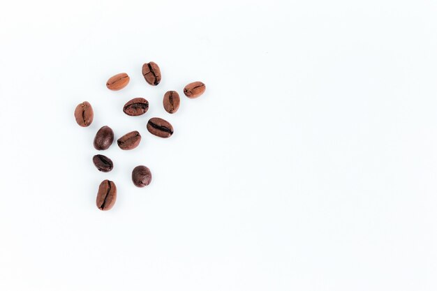 Roasted coffee beans on the white background