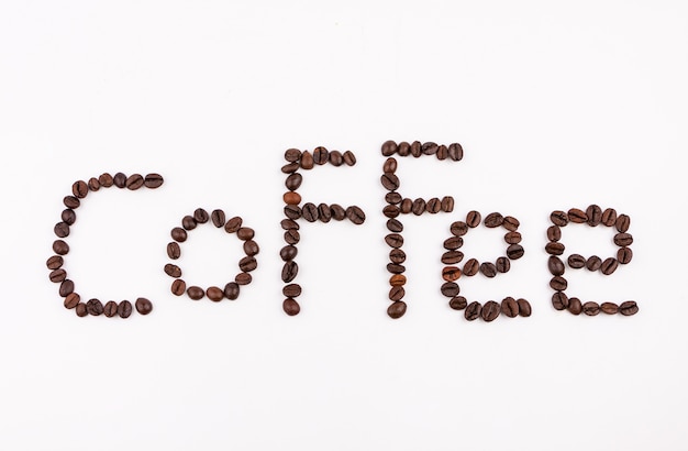 Photo roasted coffee beans on white background