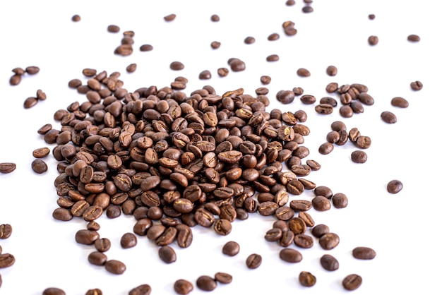 Roasted coffee beans on white