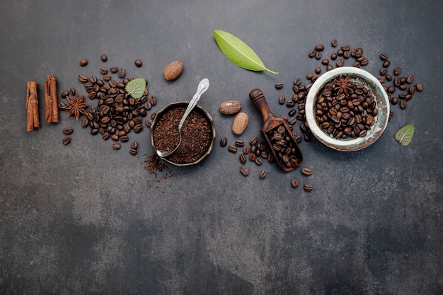 Roasted coffee beans with coffee powder and flavorful ingredients for make tasty coffee setup