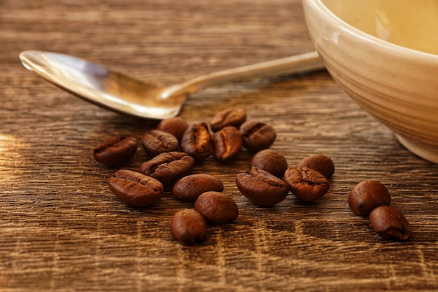 roasted coffee beans on wood table 