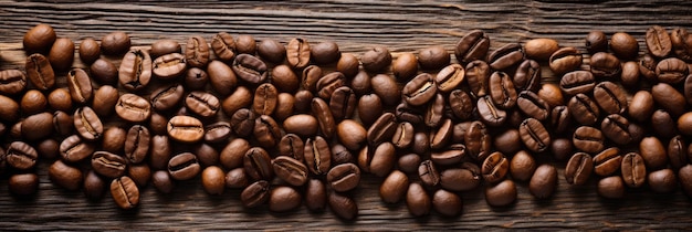 Roasted Coffee beans on wooden background texture and copy spase panorama top view