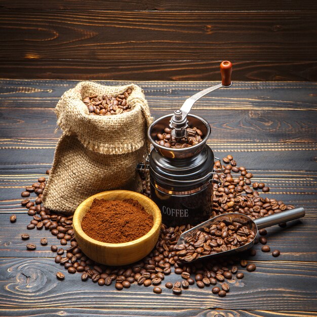 Roasted coffee beans on wooden background