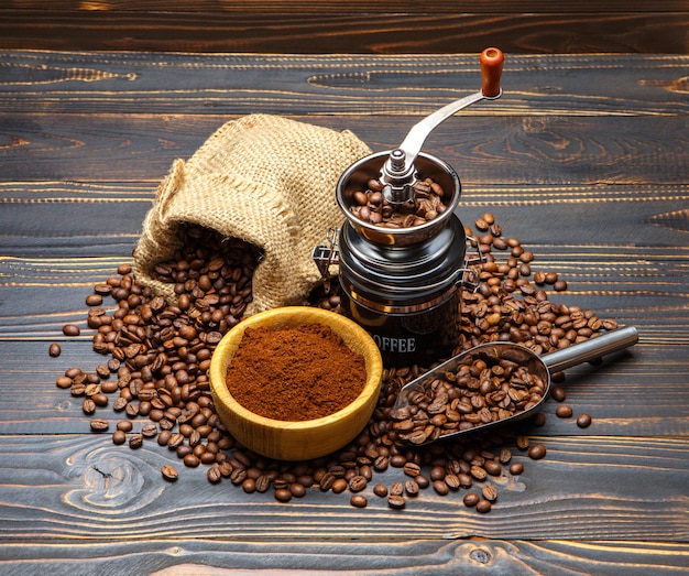 Roasted coffee beans on wooden background