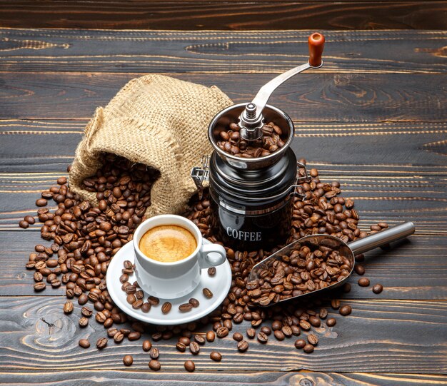 Roasted coffee beans on wooden background