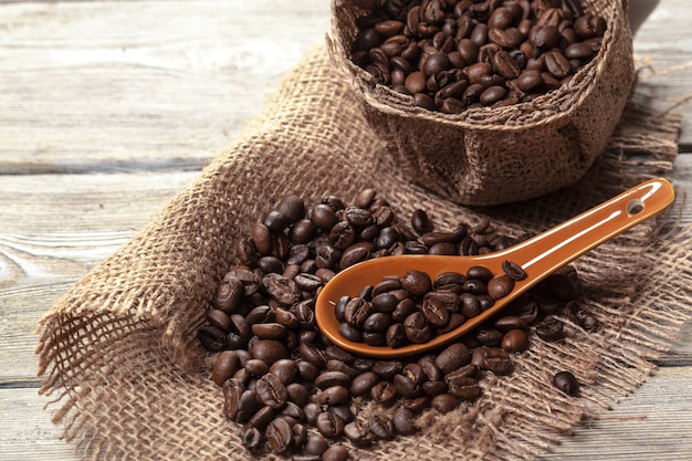 Roasted coffee beans on a wooden floor