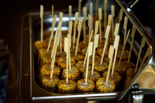 Roasted corn on a stick.