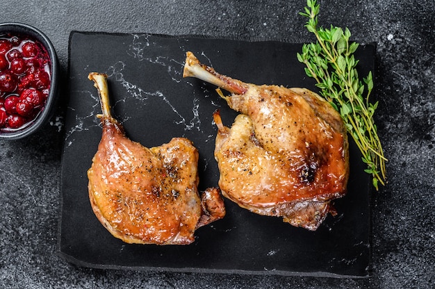 Roasted duck leg confit with cranberrie sauce