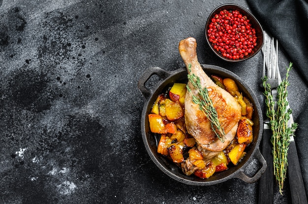 Roasted duck legs with oranges, peach and spices