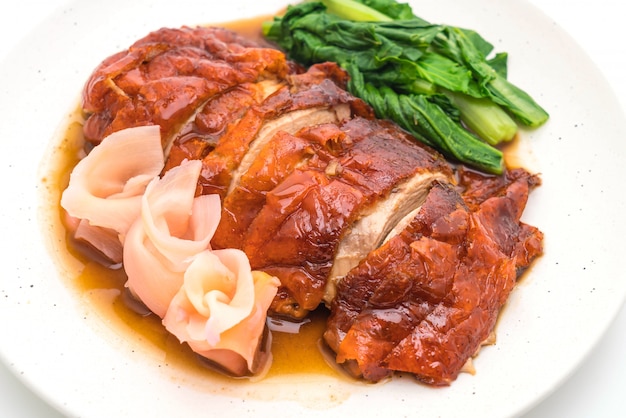 roasted duck on white background