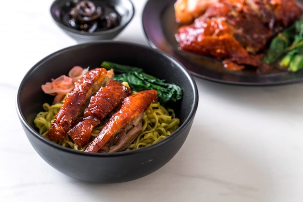 roasted duck with vegetable noodles