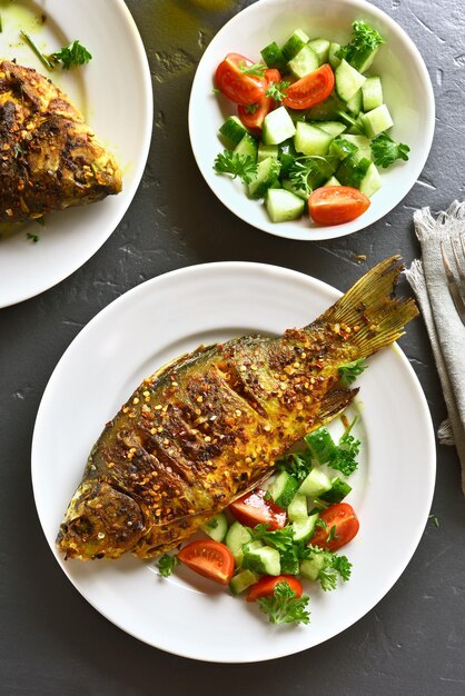 Roasted fish on plate