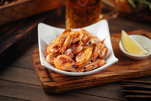 Roasted garlic shrimp appetizer with beer