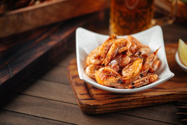 Roasted garlic shrimp appetizer with beer