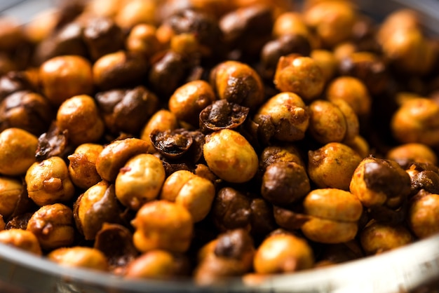 Roasted Masala Chickpea or chana known as chatpata futana or Phutana in Hindi served in a bowl. Selective focus