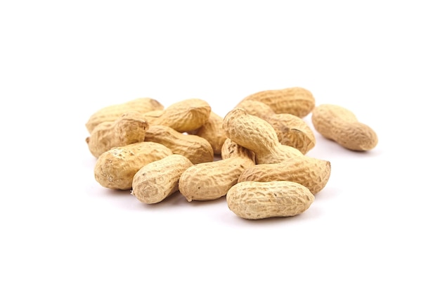 Roasted peanuts in shell isolated on white background