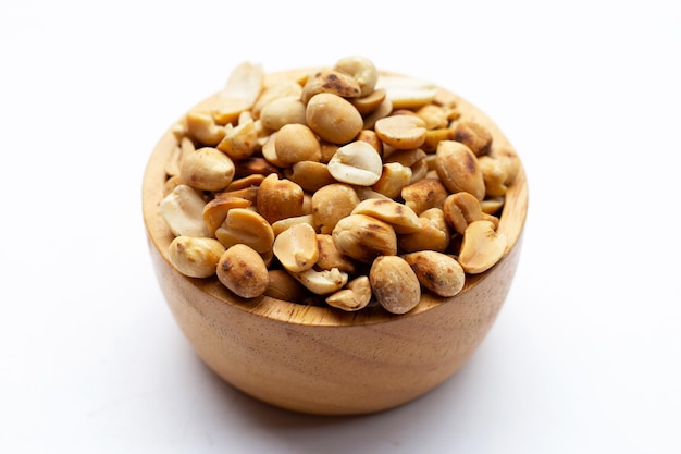 Roasted peanuts on white background