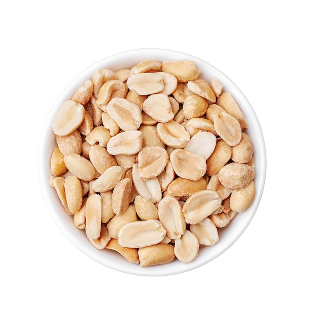 Roasted peanuts in a white cup top view on a white background