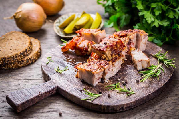 Roasted pork belly with crust pickles and bread