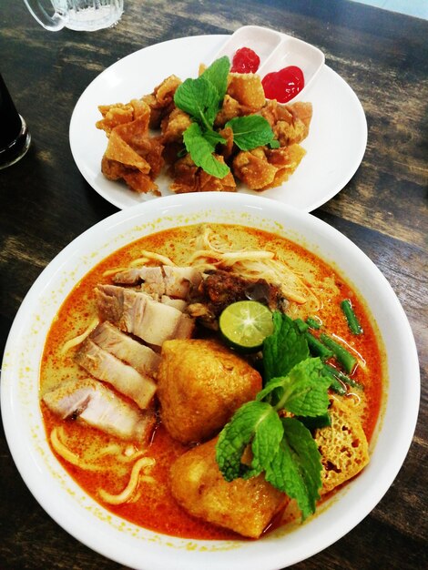 Roasted pork curry noodles and fried wanton