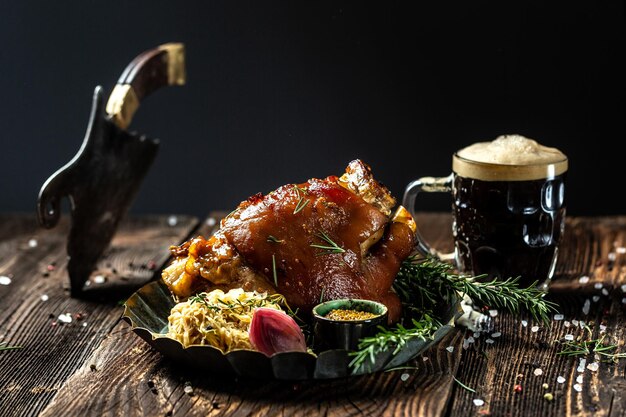 Roasted Pork knuckle with beer and sauerkraut Oktoberfest menu