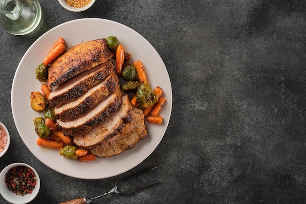 Roasted pork Loin with carrot and broccoli Grilled sliced Pork Meat