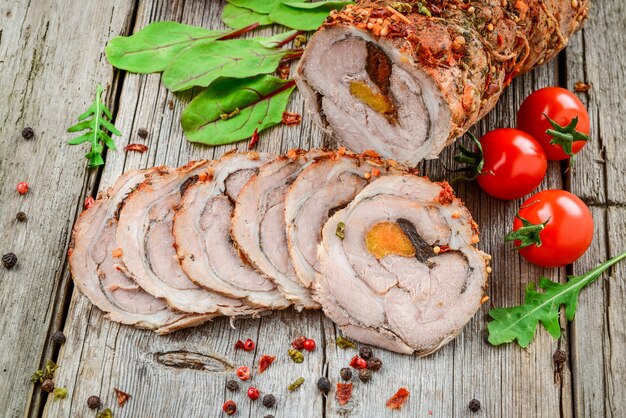 Roasted Pork Roll stuffed with Dried Apricots, Cheese and Walnuts.