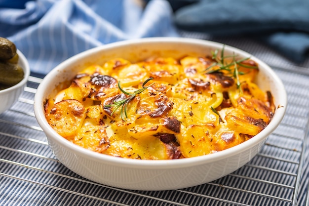 Roasted potatoes in baking dish traditional easten european food titled as France Potatoes.