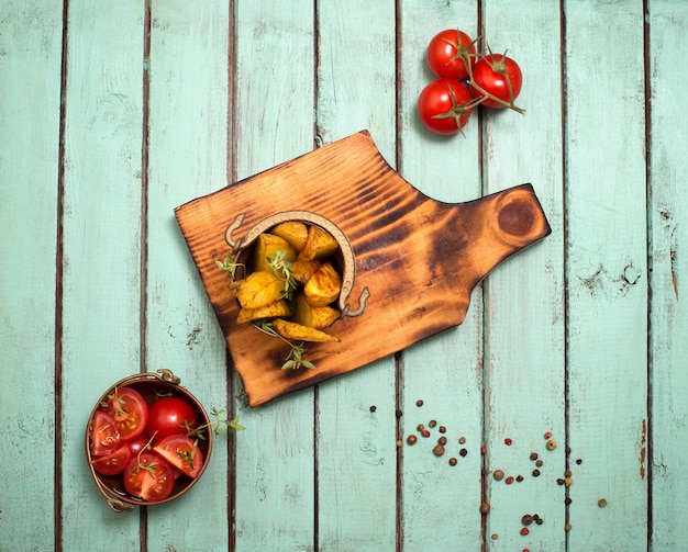 Roasted potatoes with thyme and cherry tomatoes