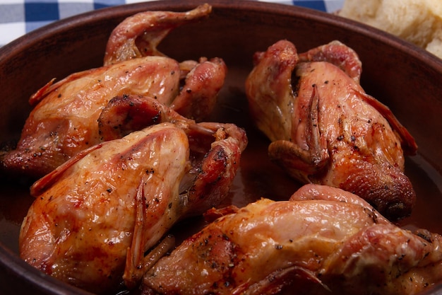 Roasted quail with Golden brown crispy crust Closeup