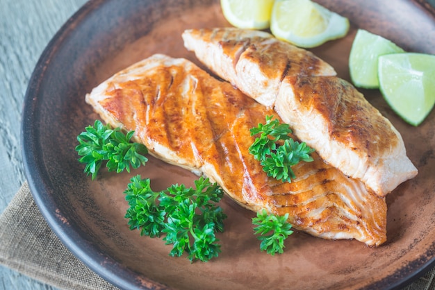 Roasted salmon steak with fresh parsley