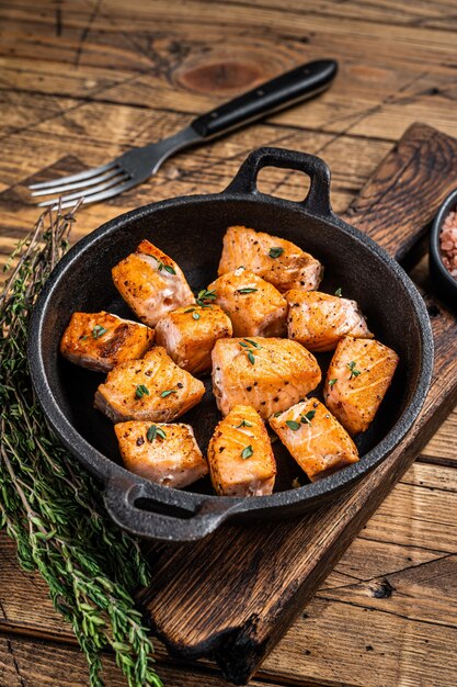 Roasted salmon or trout fish in a pan