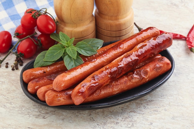 Roasted sausages in the plate for breakfast