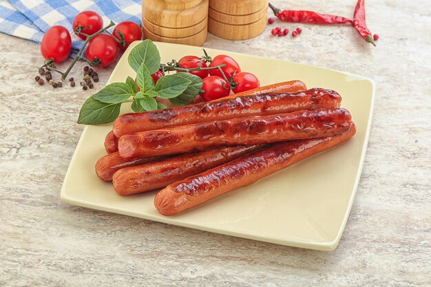 Roasted sausages in the plate for breakfast