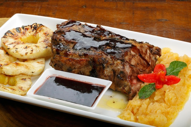 roasted steak with salad and potato