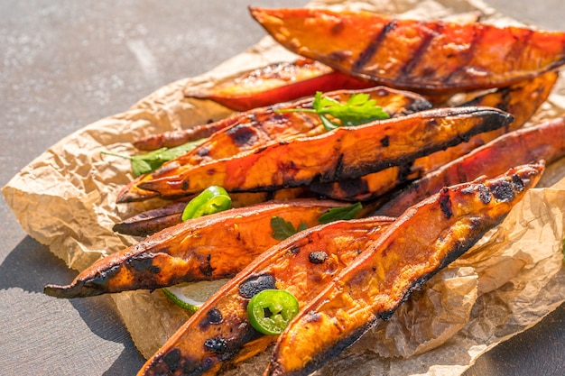 Photo roasted sweet potatoes on the grill