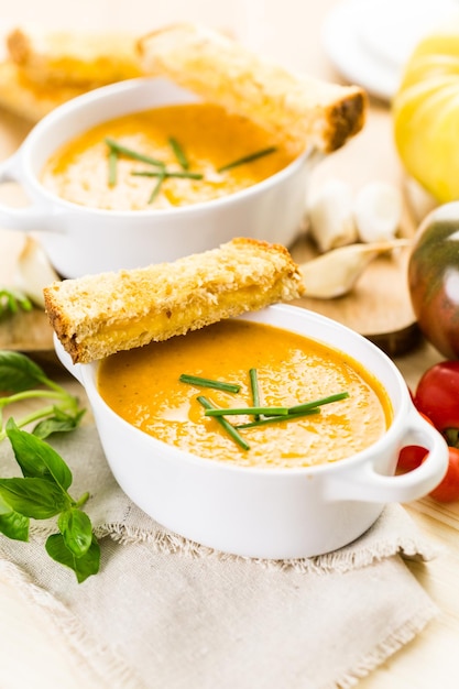 Roasted tomato soup cooked with organic heirloom tomatoes and served with grilled cheese sandwich.