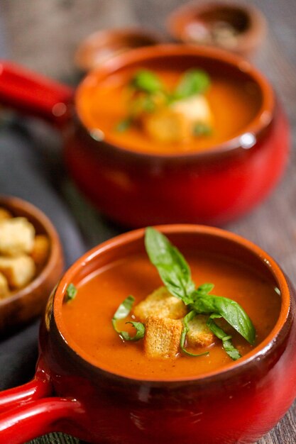 Roasted tomato soup with fresh basil and croutons.