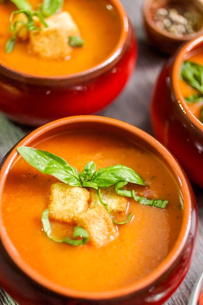 Roasted tomato soup with fresh basil and croutons.