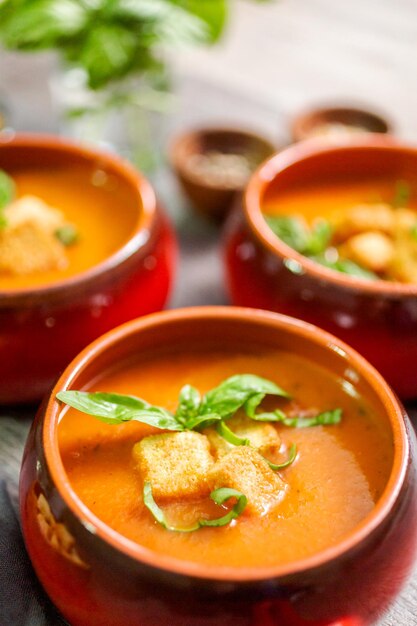 Roasted tomato soup with fresh basil and croutons.